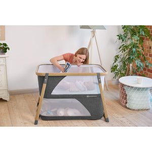 Kinderkraft 4-in-1 Travel Cot Sofi real life photo mother and baby in cot 